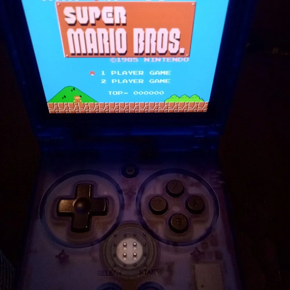 Pre-Loaded Anbernic RG35XXSP blue transparent with most retro platforms 64gb